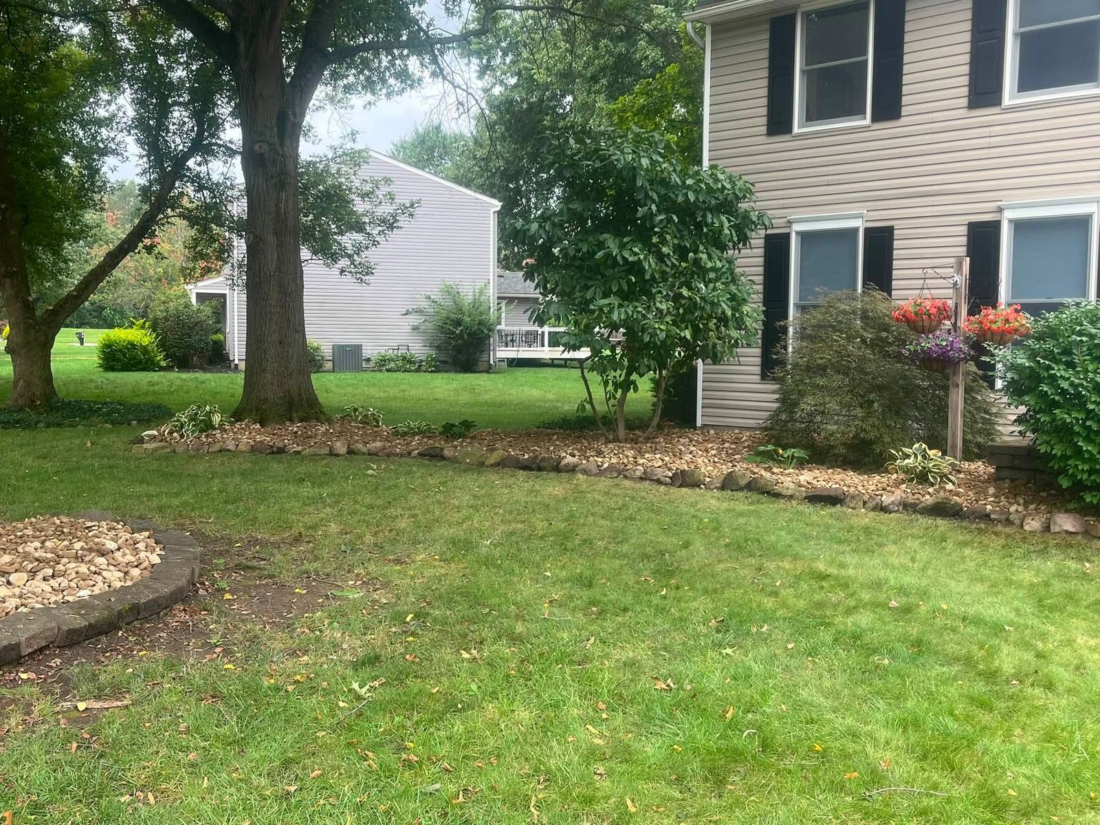Fresh-cut lawn and edged beds from the same job
